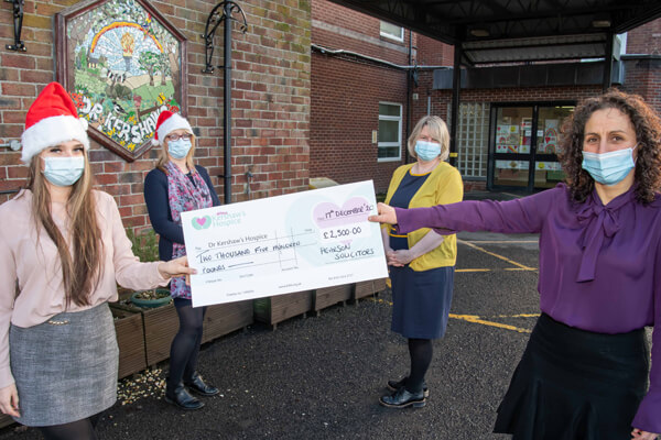 earson Solicitors in Oldham donating £2500 to Dr Kershaw's Hospice